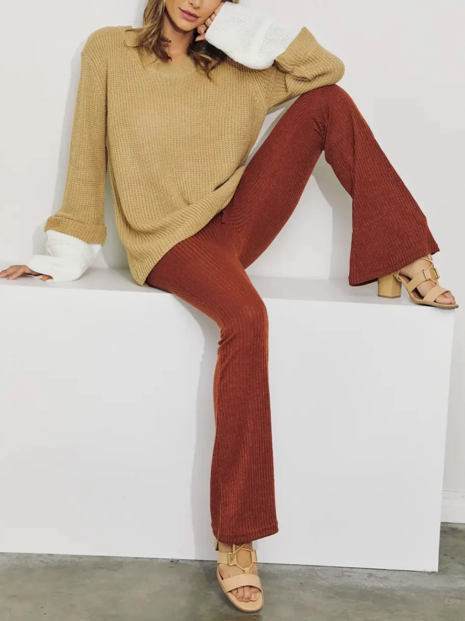 LAYERED SLEEVE KNIT SWEATER